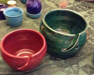 red bowl and green bowl, both with a clever slit