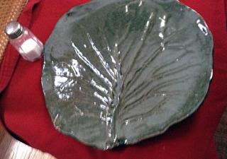 grey plate with leaf design