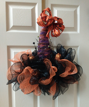 A truly wonderful wreath in the shape of a witch's hat. Great colors though mostly black.