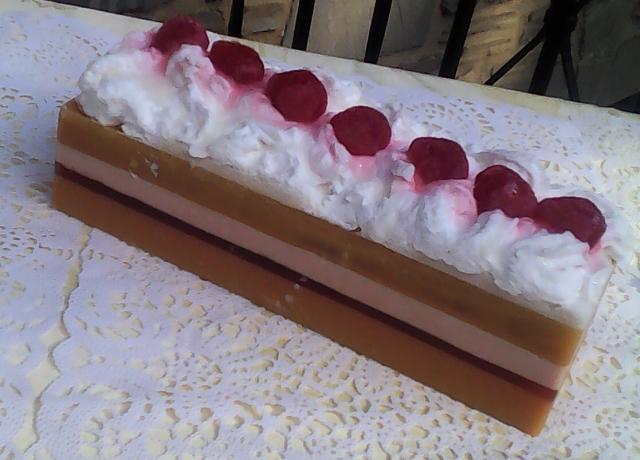 soap that looks like cake topped with whipped cream and cherries