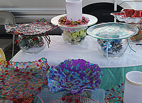 Colorful glass bowls, candle holders, cake plates, etc.