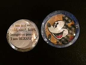 Small glass magnets.  Shown as examples is a Mickey Mouse and a quote: "I am not wet, cold, tired, hurt, hungry or poor.  I am BLESSED!"