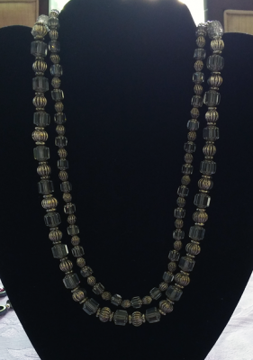 gold and glass bead necklace with 2 strands