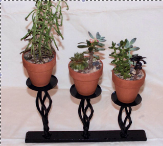 metal holder for three potted plants