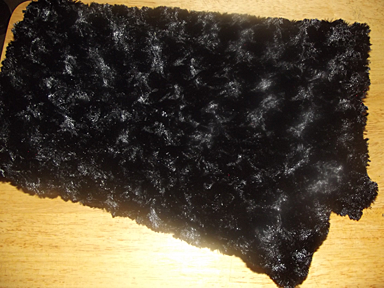 Black furry scarf.