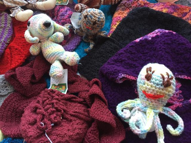 crocheted hats, puppy, and octopus
